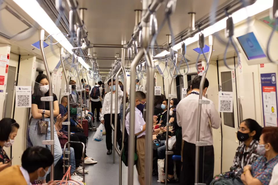 Subway riders in Bangkok wear masks during the pandemic.